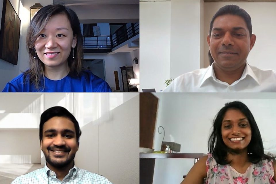 Four people on a video conference call screen