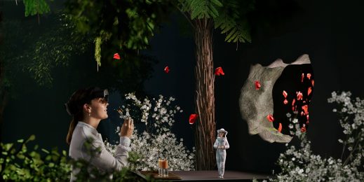 A woman woman wearing a mixed reality headset tastes a honey sample during a mixed reality show.