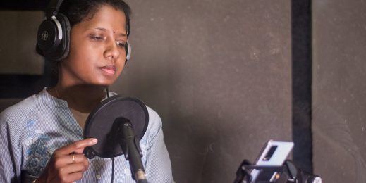 A women shown recording speech samples on Karya.