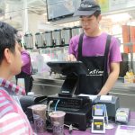 Chatime's cashier Choong keys in personalized customer orders using the new POS system running on Windows and Azure_2