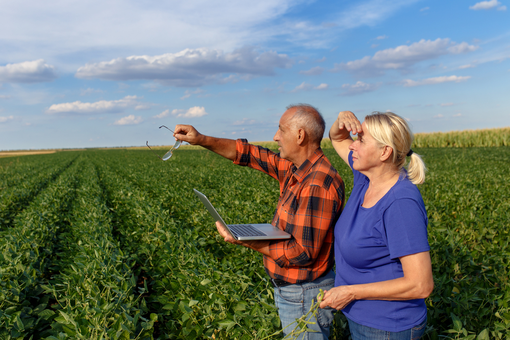Man and Woman in farming field