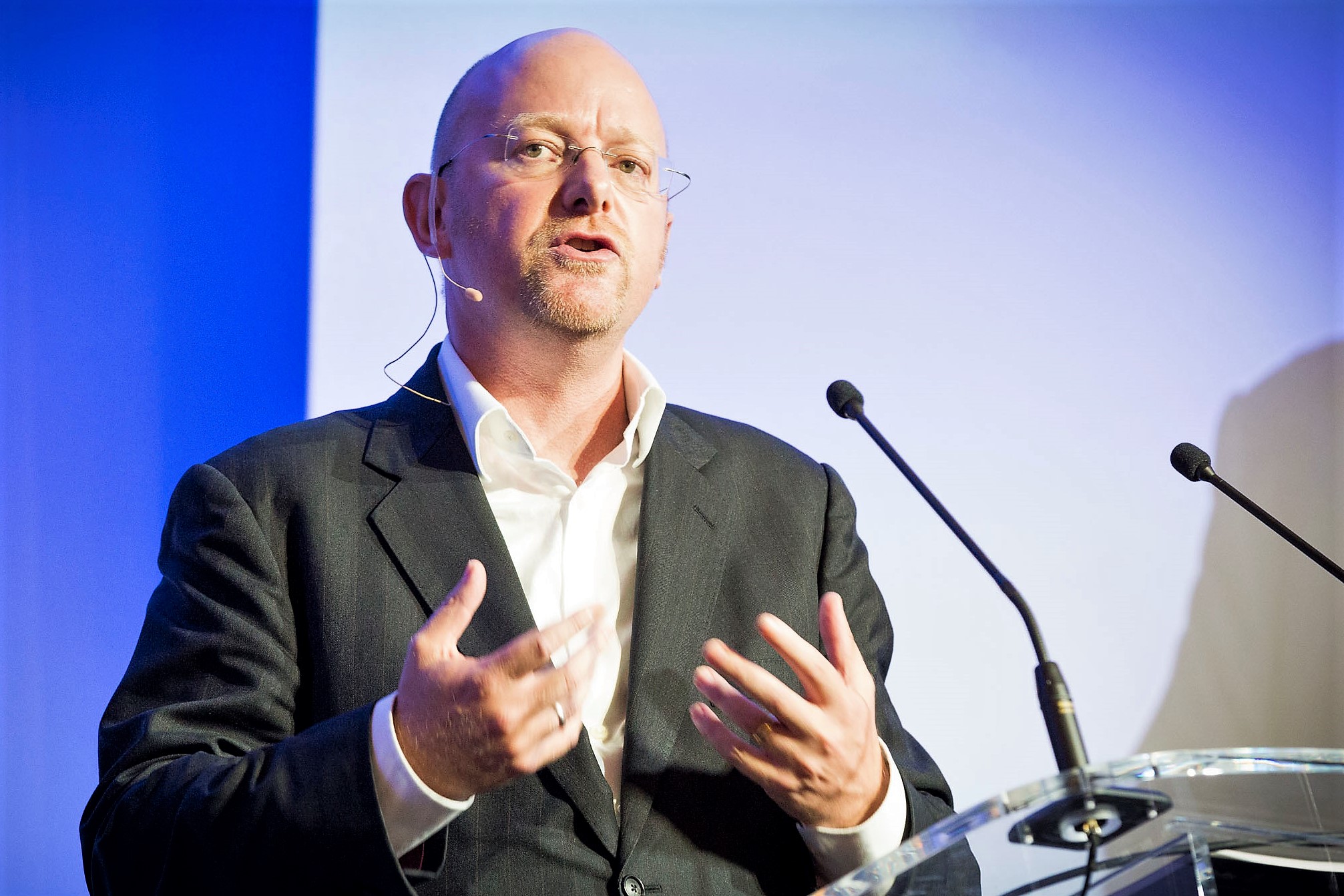 Man speaking at a conference