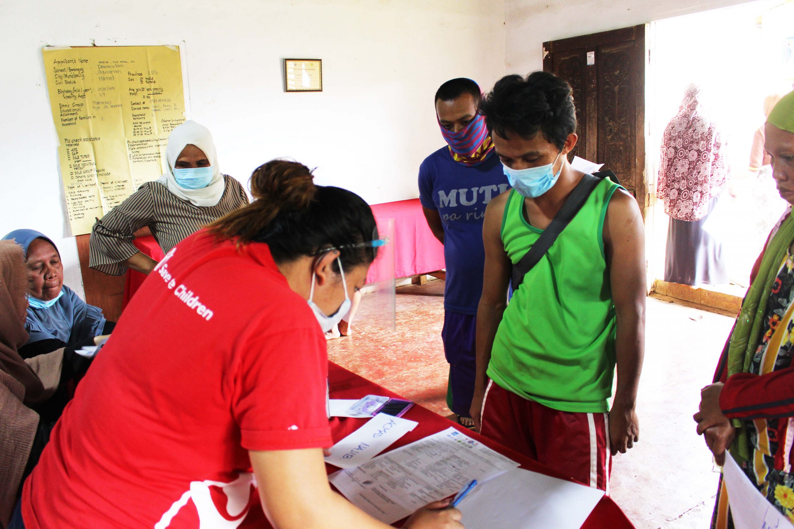 Photo of beneficiary receiving aid