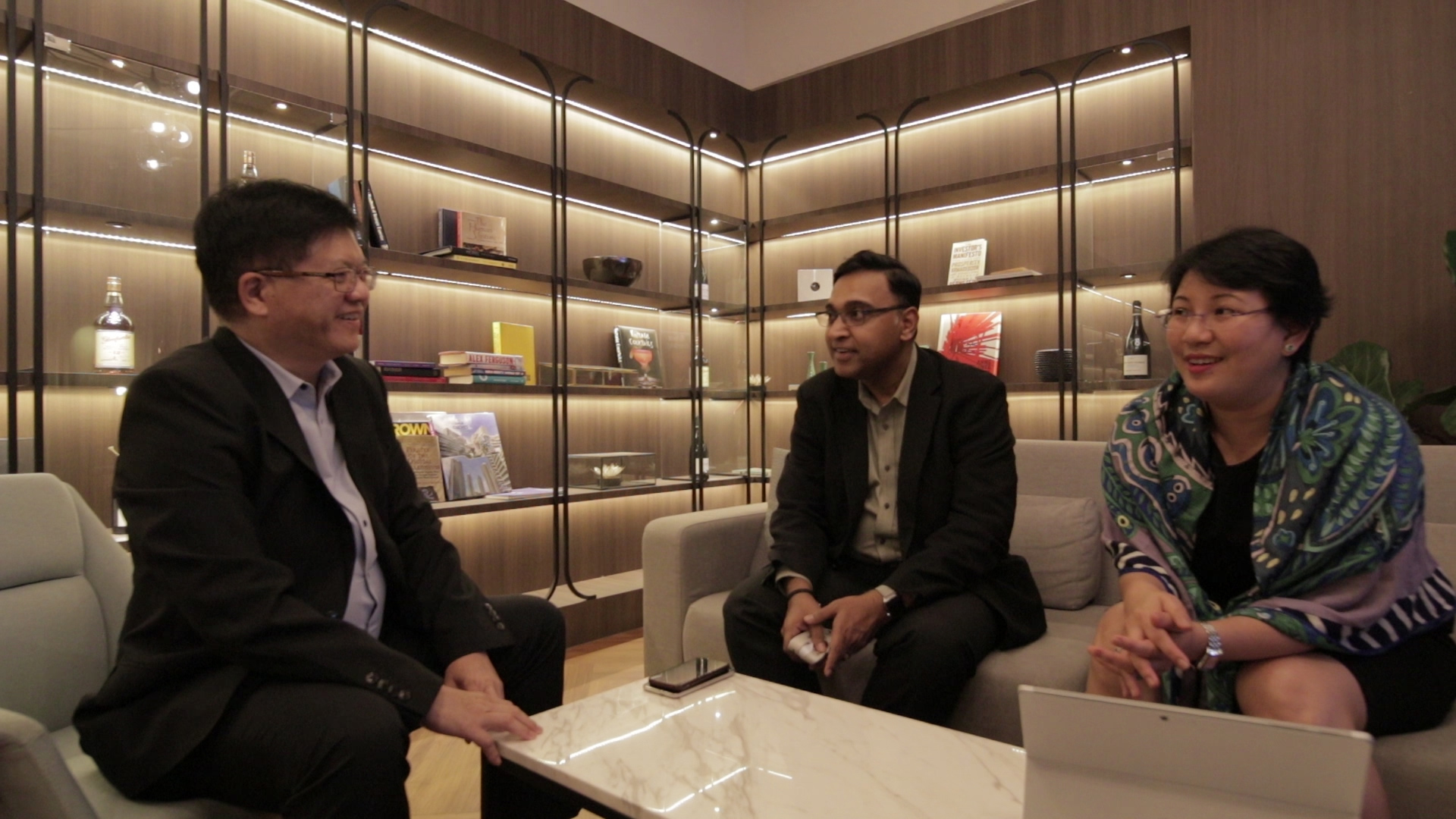Ong Ba Sou, Director of Technology; Rajesh Sreenivasan, Head of Technology, Media and Communications; and Leong Lu Yueh, Deputy Head, Funds and Investment Management at Rajah & Tann discussing how technology can be introduced to improve the legal workflow