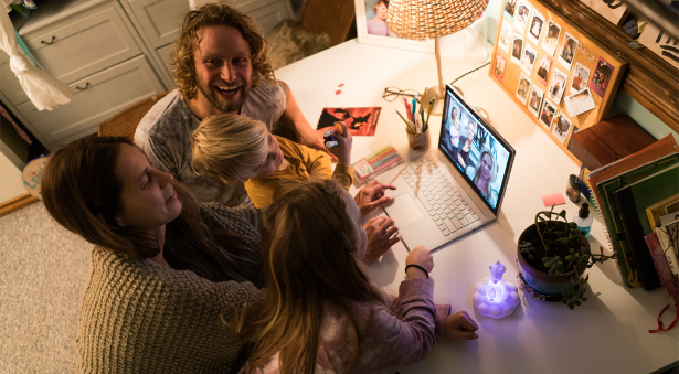 family around the laptop