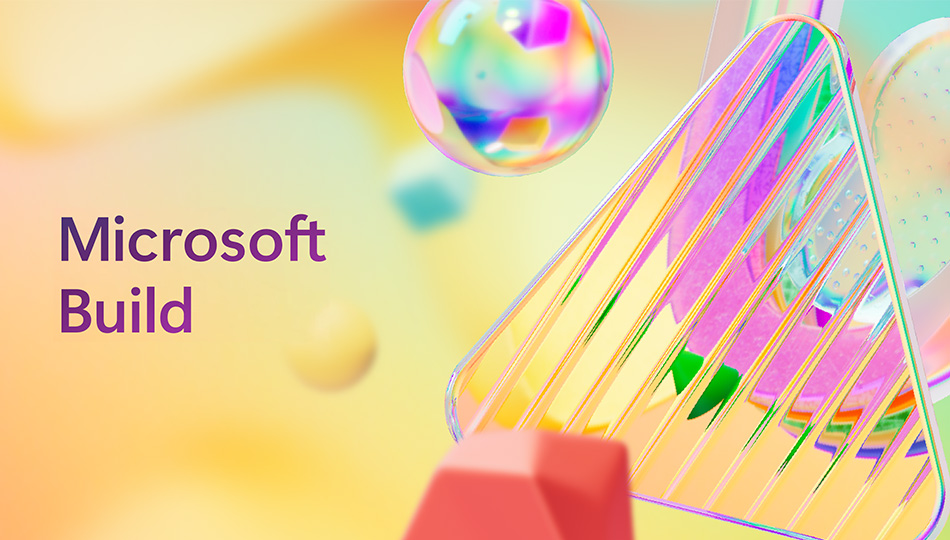Keltainen taustakuva, jossa saippuakupla ja kiiltävä kolmio. Teksti "Microsoft Build".