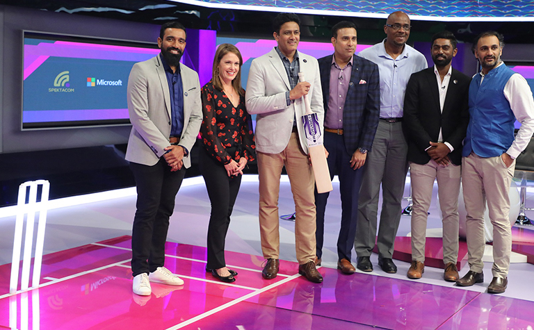 A group of happy people looking into the camera