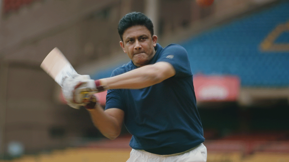 A cricket bat hitting the ball