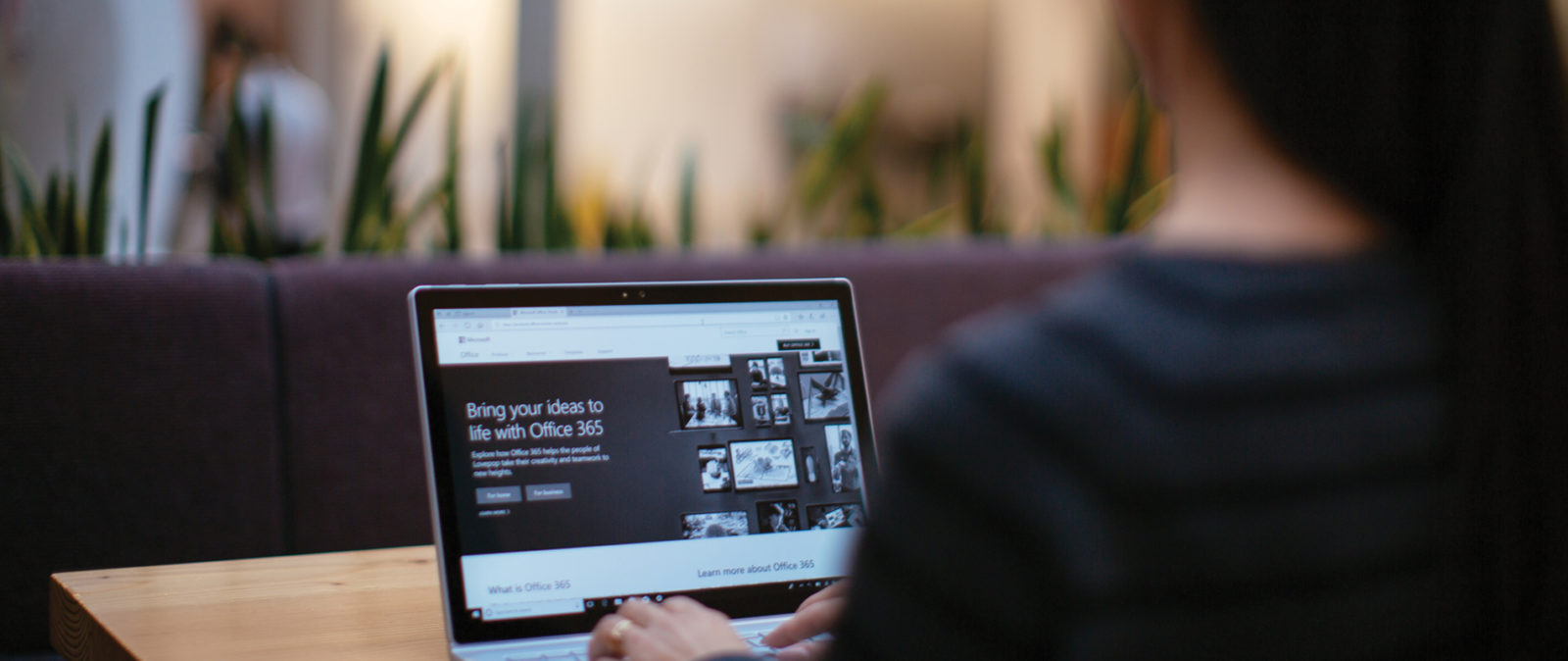 A girl using laptop with high contrast mode setting