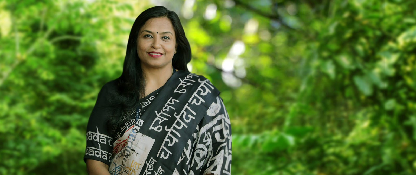 A woman smiling at the camera