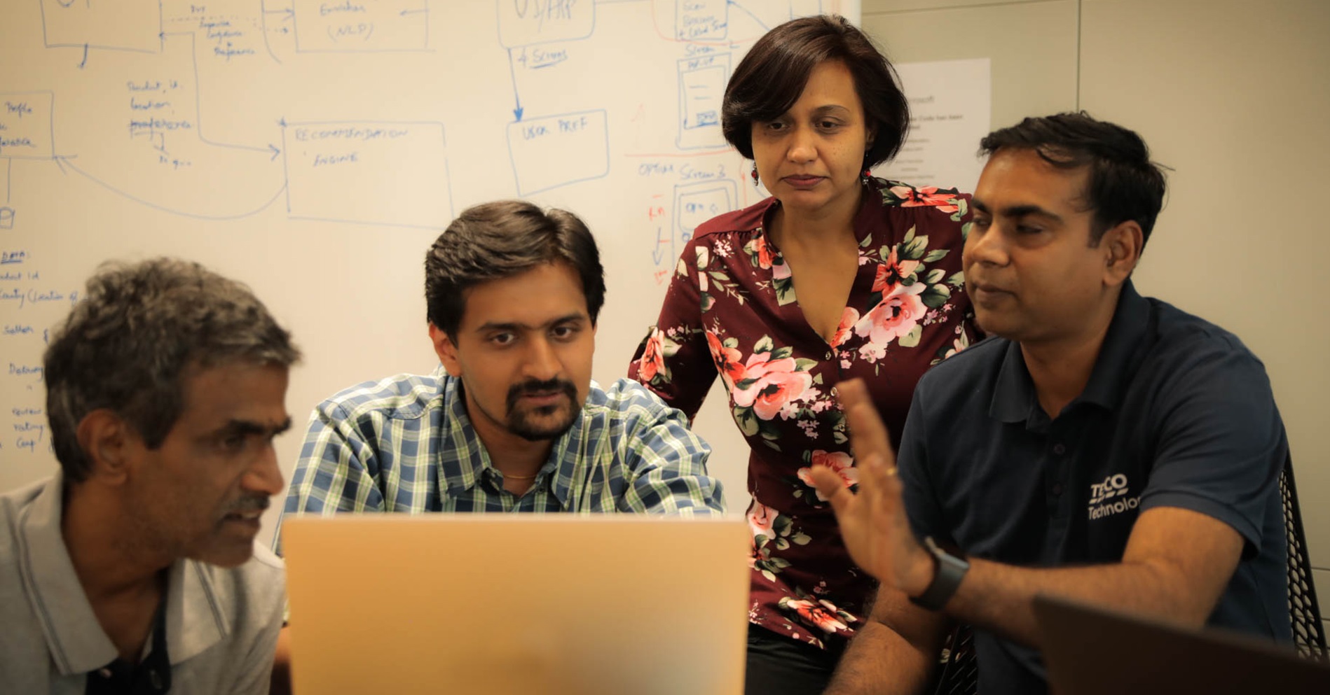 Team members discussing a topic