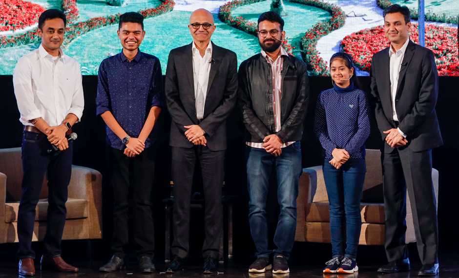 4 young innovators, Satya Nadella, CEO of Microsoft and Anant Maheshwari, President of Microsoft India posing for the camera