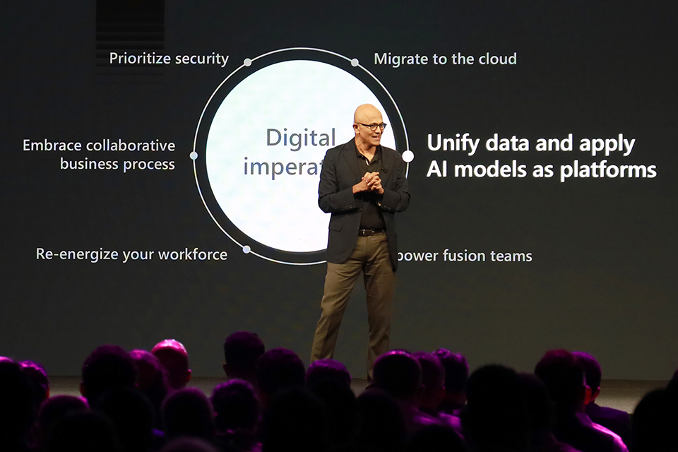 Satya Nadella presenting on stage