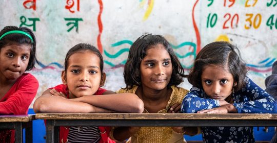 4 girls in a classroom