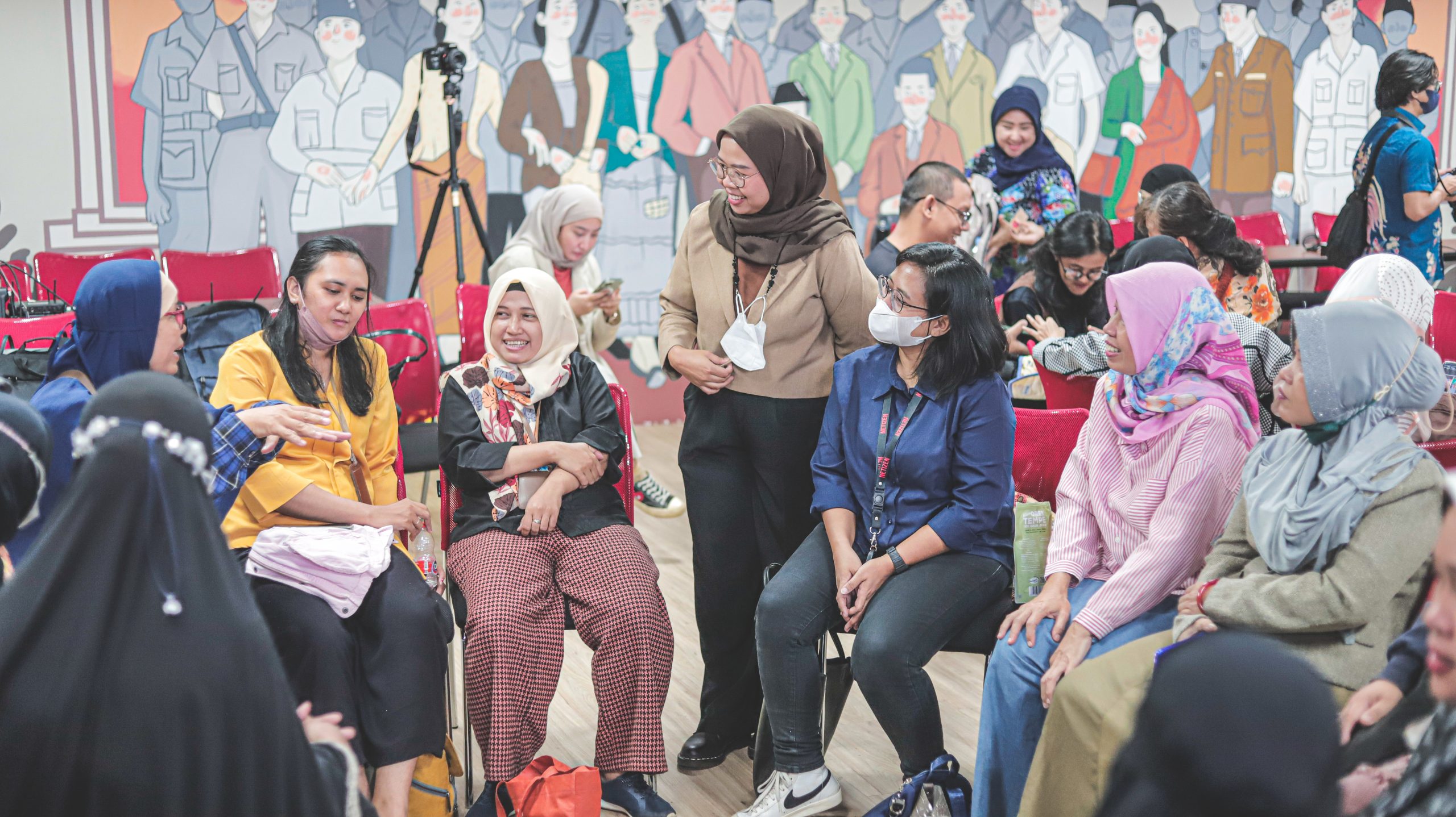 A group of women engaged in a discussion