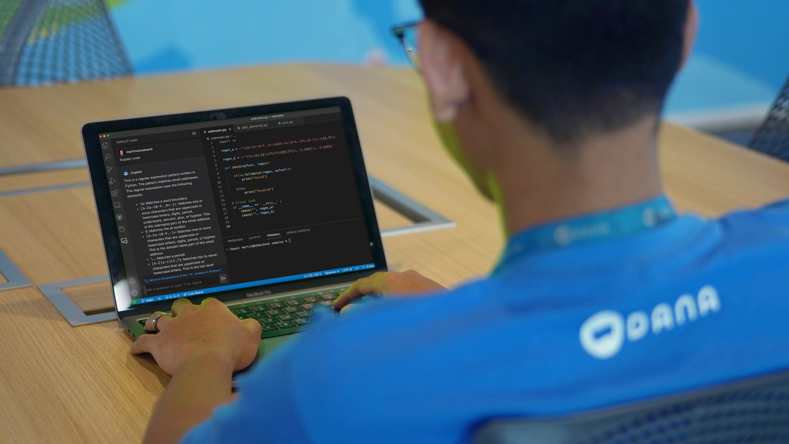 A man coding with GitHub Copilot