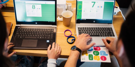 Стол, два ноутбука и руки. Фото с мероприятия в Москве, посвященного старту акции Digital Диктант