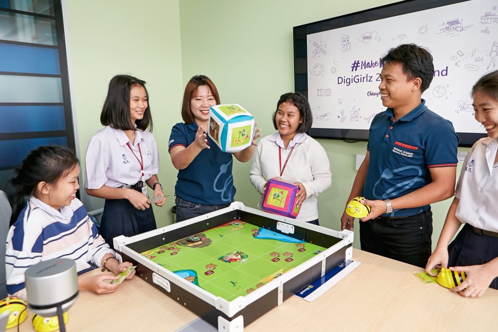Group of people playing with assorted items