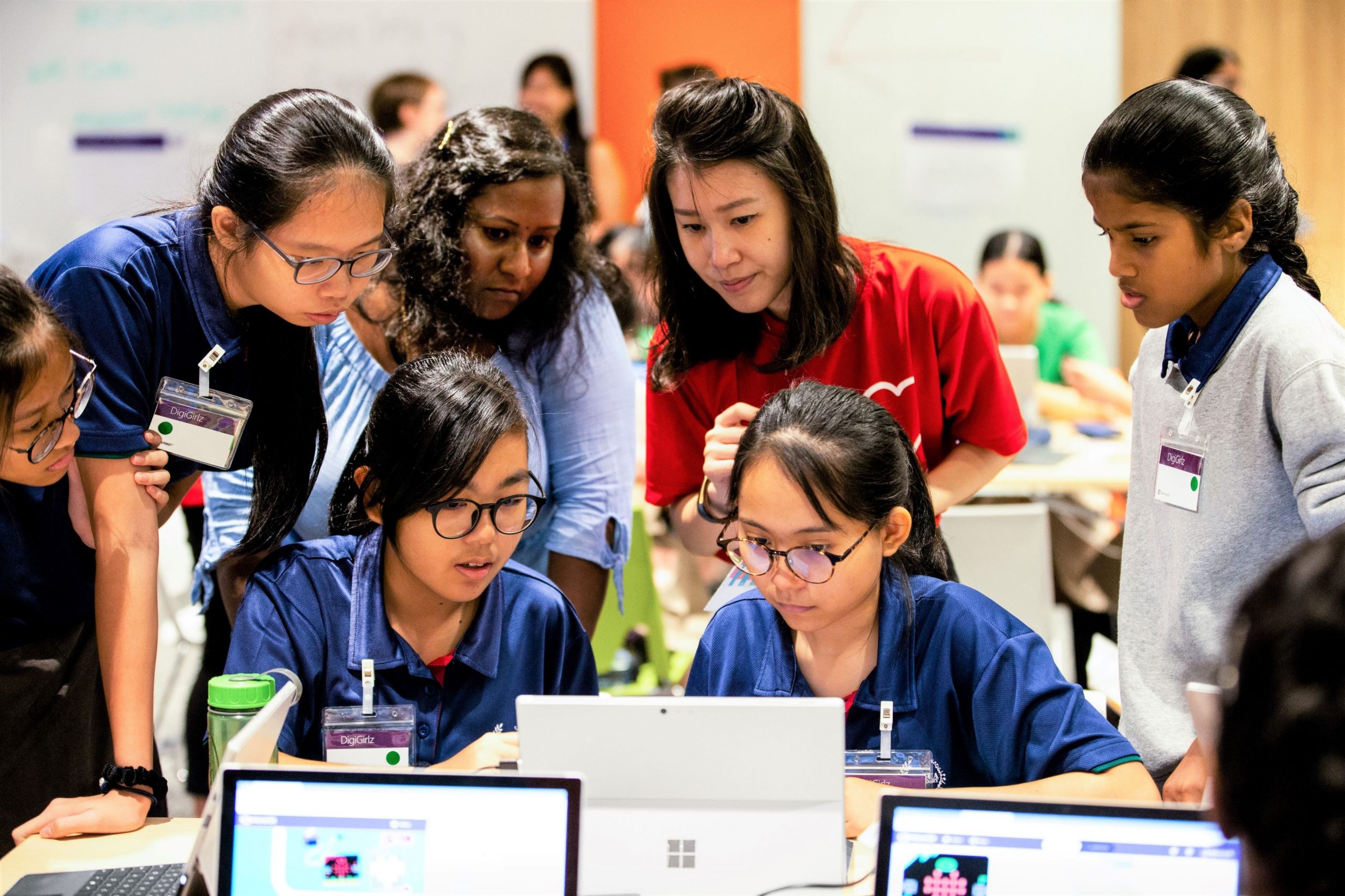 Young people in front of a computer