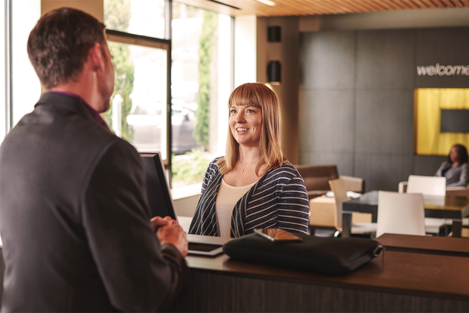 illustration of a man and woman at a bank counter