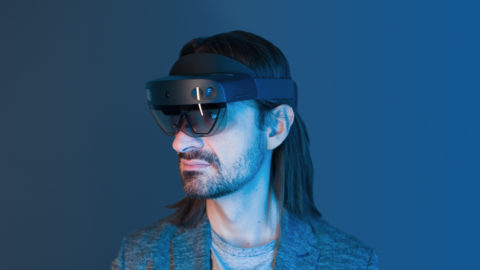 Alex Kipman with a HoloLens 2 device on his head