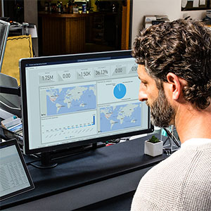 man looking at PowerBI