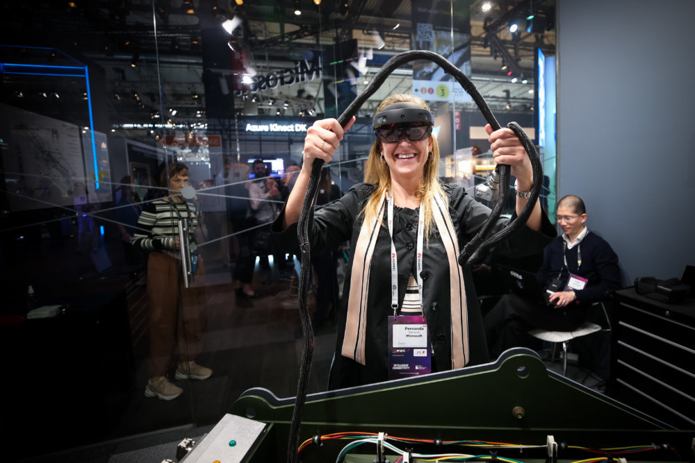 A woman wears HoloLens 2