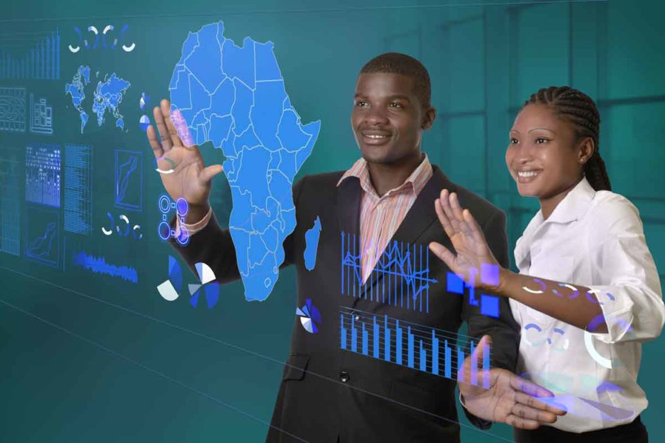 A man and a woman looking at a map of Africa surrounded by numbers and graphs.