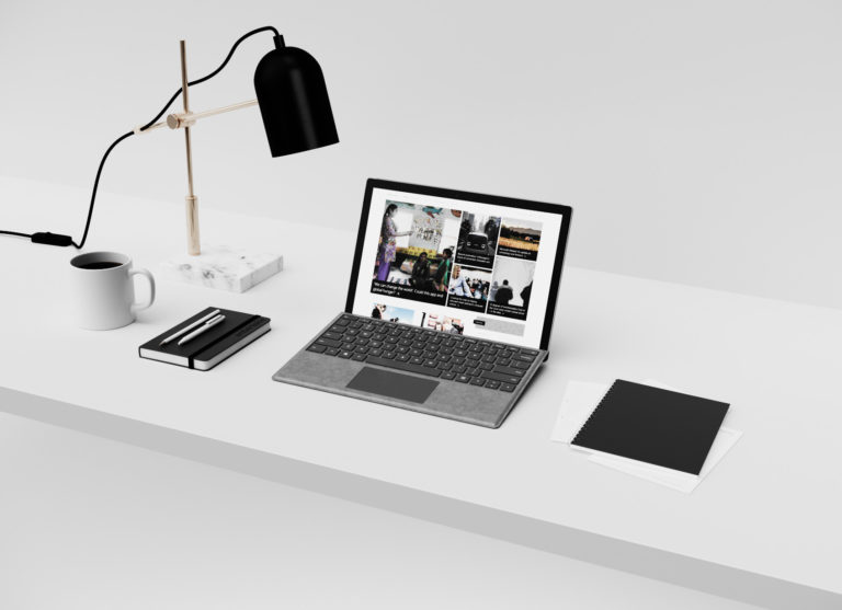 Microsoft feature stories page on laptop screen