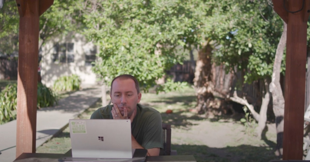 man working on laptop