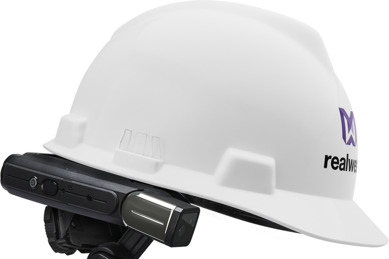 A helmet with a microphone and camera attached