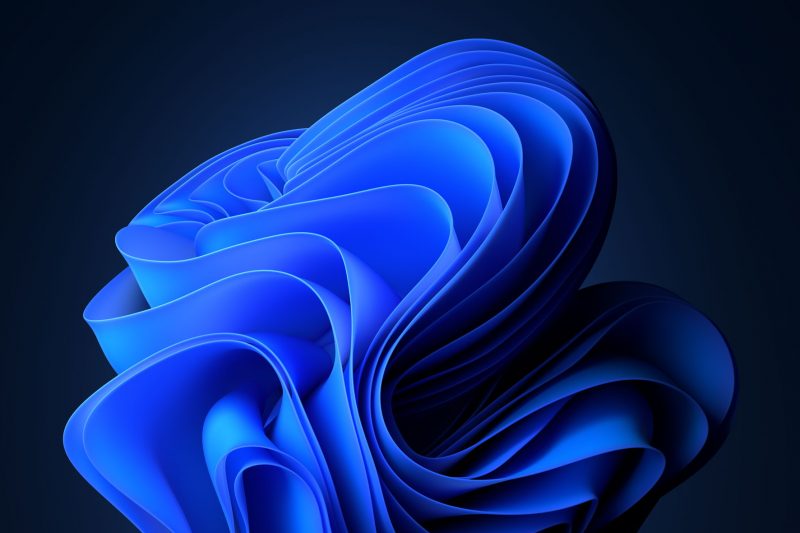 Screenshot of abstract ribbon computer desktop screensaver in dark mode