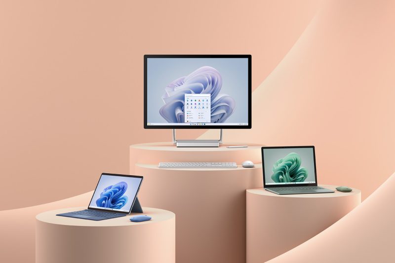 Three computers along with mice and keyboards sit atop a series of plinths.