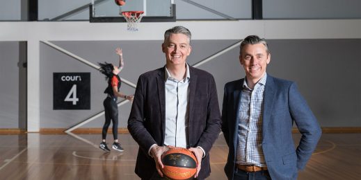 Anthony Moore and Ian Heard on a basketball court