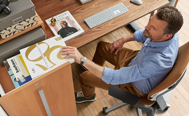Young male designer at a desk.