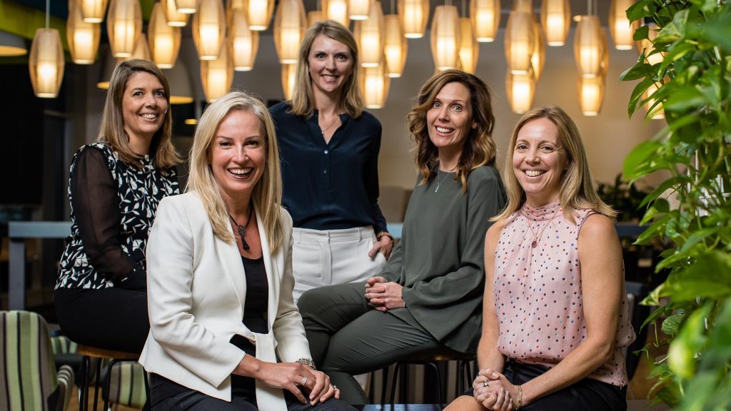 Female Microsoft executives posing for international women's day