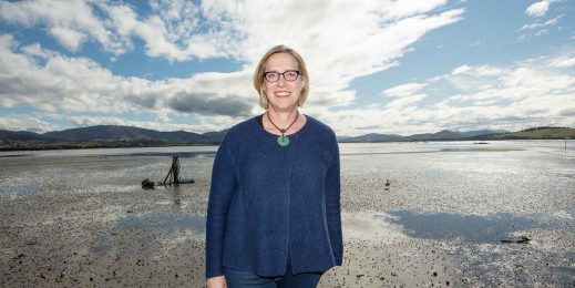 Ros Harvey standing infront of oyster farm