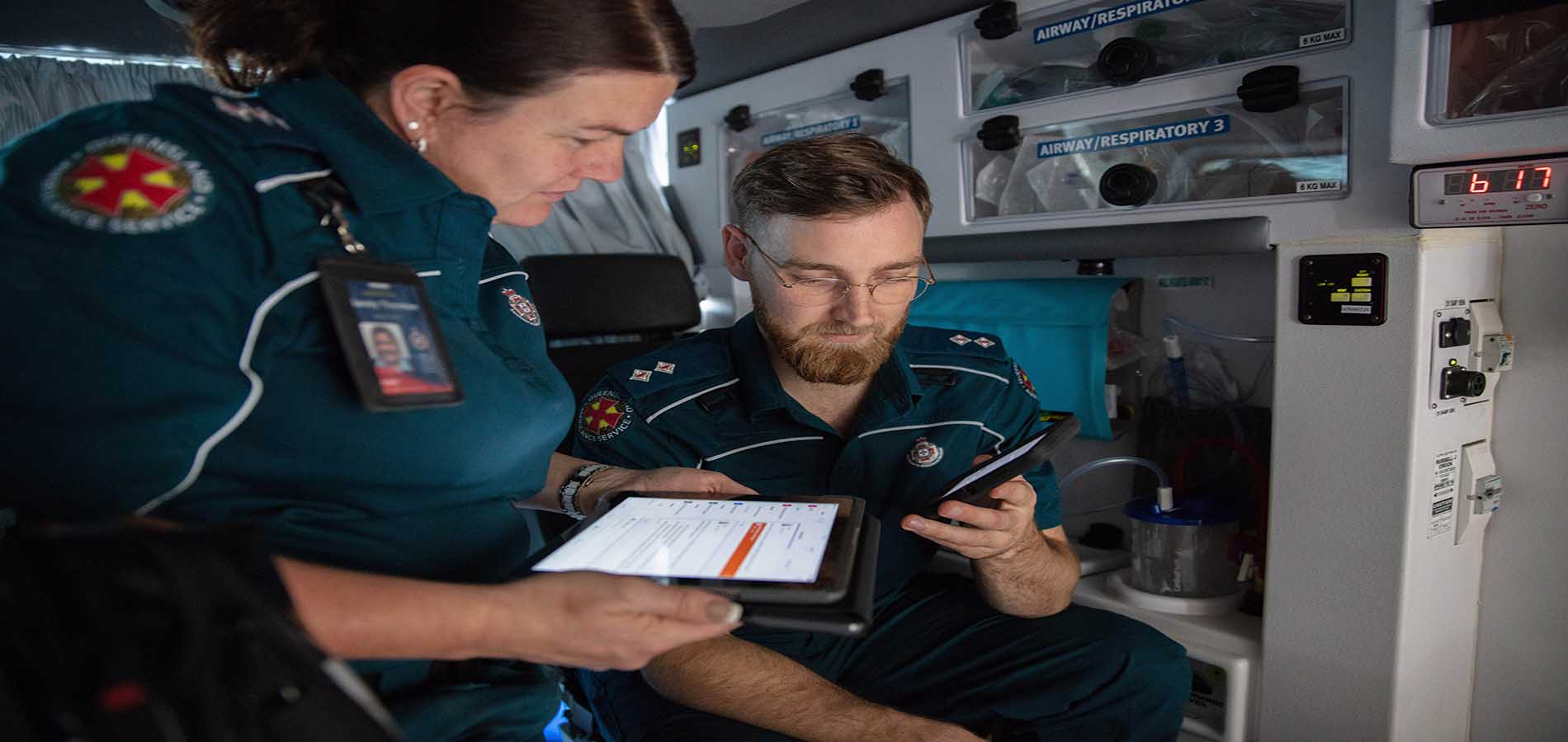 ambulance workers collaborating on teams