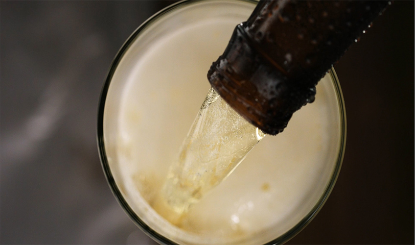 Anheuser-Busch InBev beer being poured