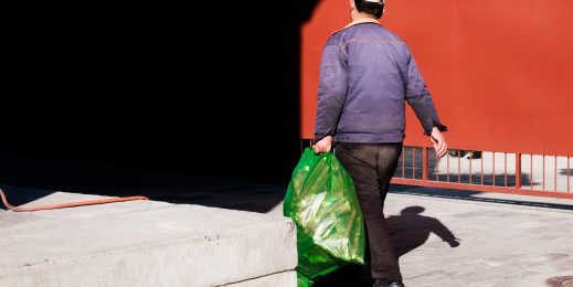 Man holding rubbish bag
