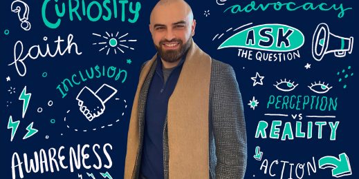 Tareq standing infront of graphical words