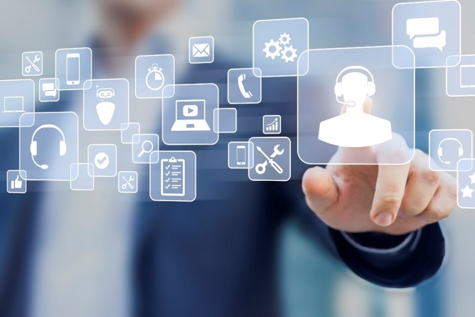 Man pressing on a tech support icon