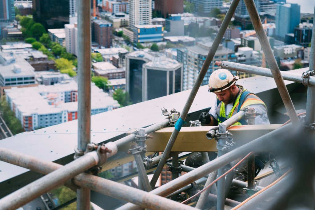 Construction worker on top of building