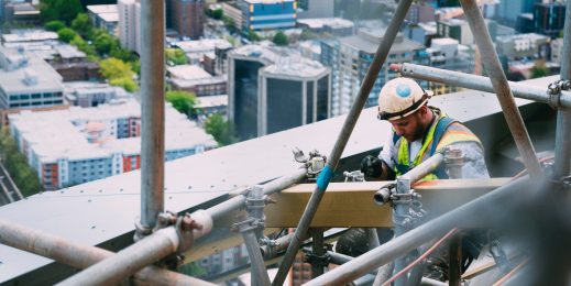 Construction worker on top of building