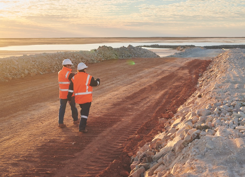 Two adults walking through a resources facility