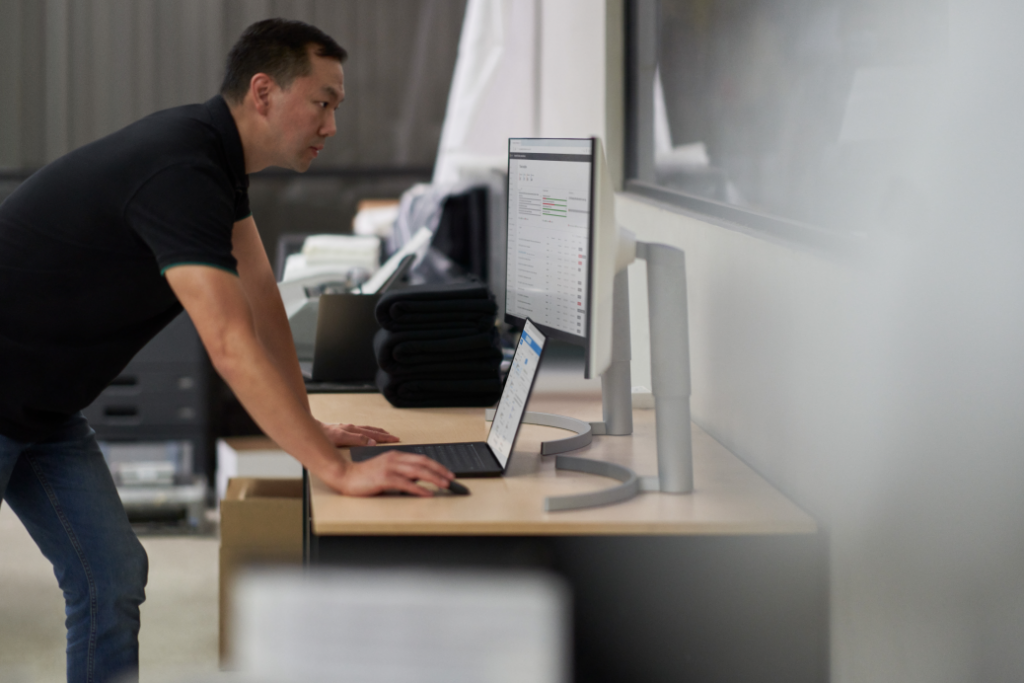 Security practitioner looking at desktop screens
