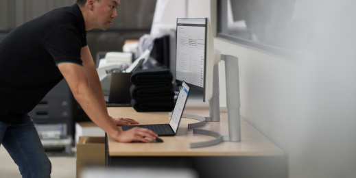 Security practitioner looking at desktop screens