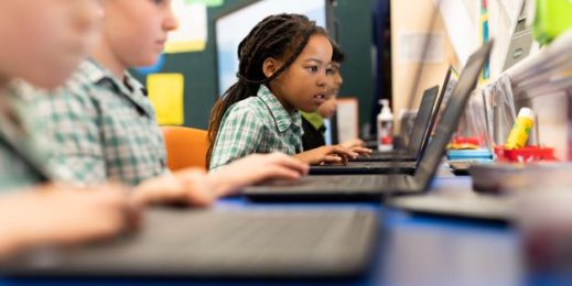 Group of young students on laptops