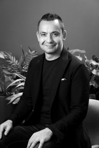 Portrait image of an adult male, black and white, Christian Barrios