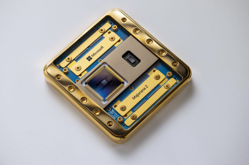 A mostly gold-colored chip with bits of blue showing. The names "Microsoft" and "Majorana 2" are visible.